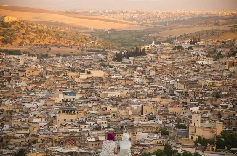 Panoramic view of Fes at sunset, when the medina transforms during Ramadan as families prepare for ftoor