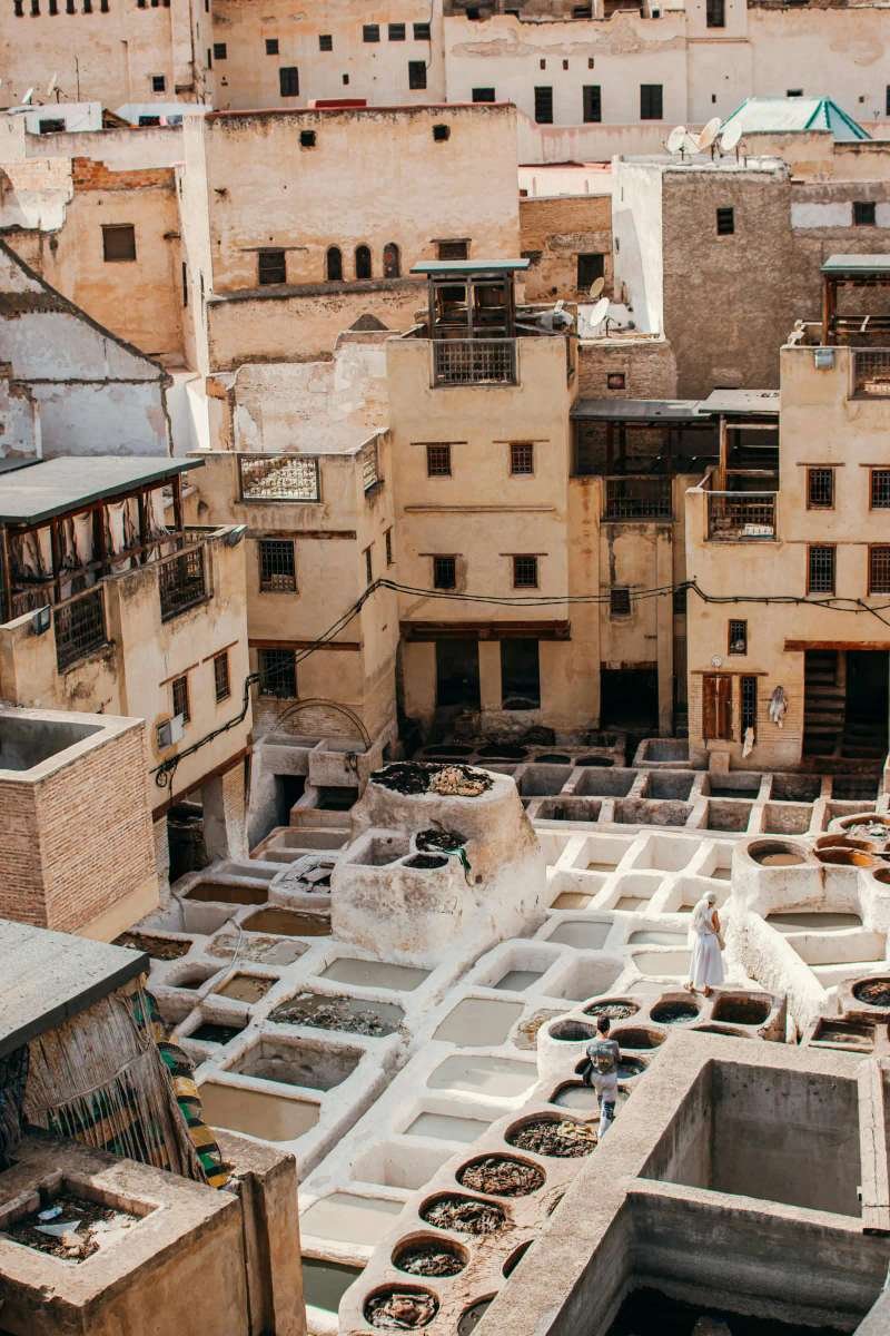 Traditional Fes tanneries with colorful dye vats - living heritage