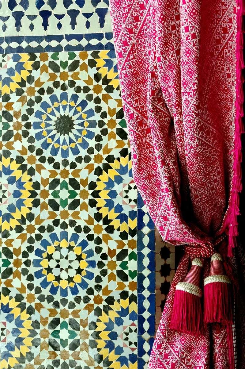 Traditional Moroccan zellige tilework with intricate geometric patterns