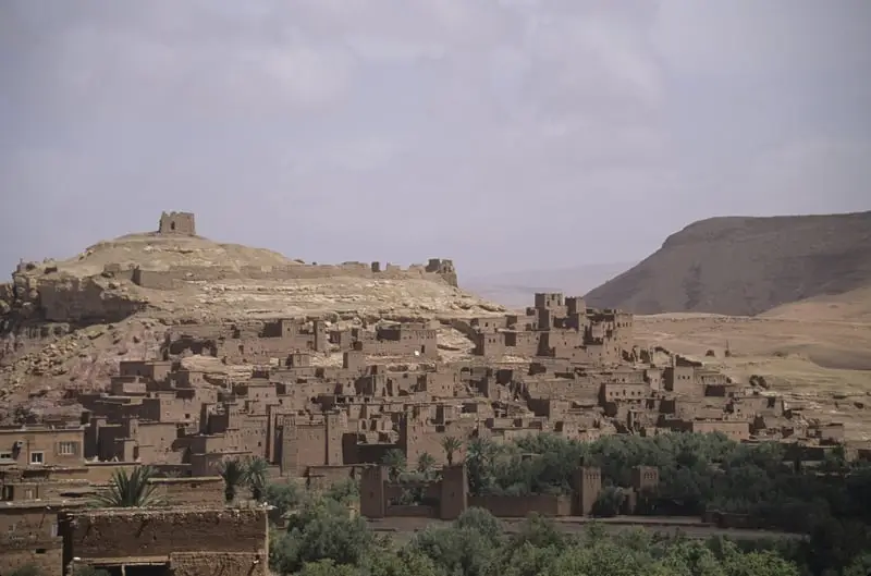 A panoramic view of Aït Benhaddou village against the arid desert landscape.